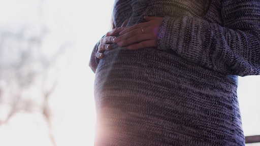 Why does my back hurt during pregnancy?