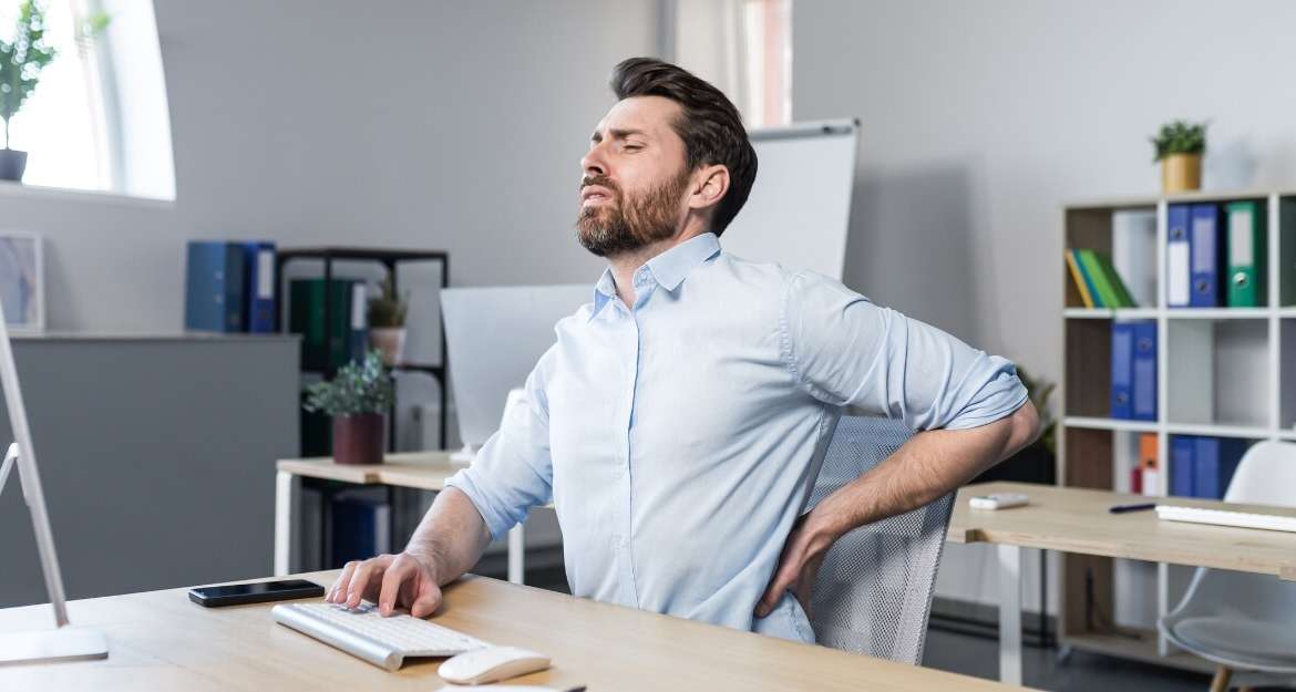 Low Back Pain from Sitting at Desk: Tips and Tricks to Relieve Discomfort