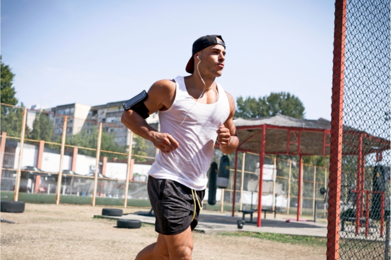 An image of a runner running with sore back