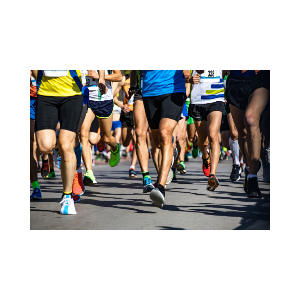 Runner captured mid-stride on a city street, motion blur conveying speed